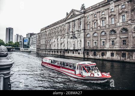 Berlin, Germany / 14 May 2019: Excursion boat on Spree river near famous Museumsinsel (Museum Island) Stock Photo