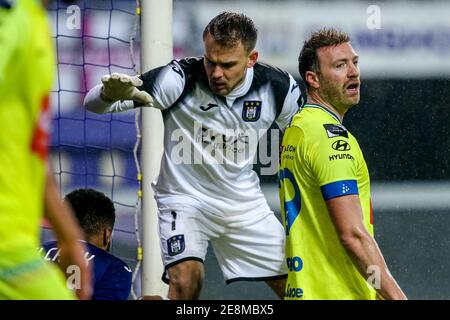 BRUSSELS, BELGIUM - JANUARY 31: Timon Wellenreuther of RSC Anderlecht, Laurent Depoitre of KAA Gent during the Pro League match between RSC Anderlecht Stock Photo