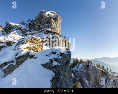 female hiker in beautiful snow covered mountains Stock Photo
