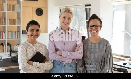Group portrait of happy international team of female students Stock Photo