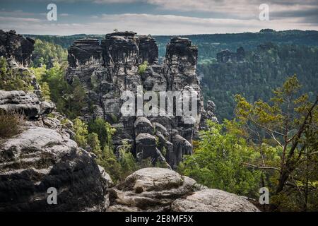 The Bastei is a rock formation towering above the Elbe River in the Elbe Sandstone Mountains of Germany. Stock Photo