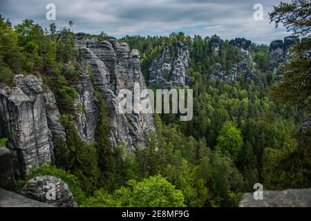 The Bastei is a rock formation towering above the Elbe River in the Elbe Sandstone Mountains of Germany. Stock Photo