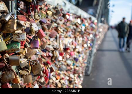 cologne, NRW, Germany, 01 31 2021, lovelocks on Hohenzollernbrige in Cologne, bokeh background Stock Photo