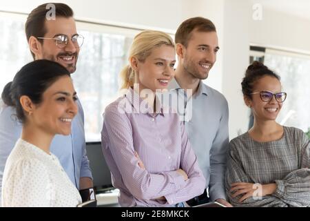 Happy business group of multiethnic employees posing for corporate picture Stock Photo