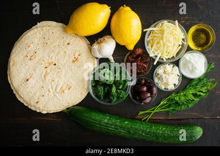 Greek Quesadillas with Tzatziki Sauce Ingredients: Raw ingredients used to cook Greek-Mexican fusion cuisine Stock Photo
