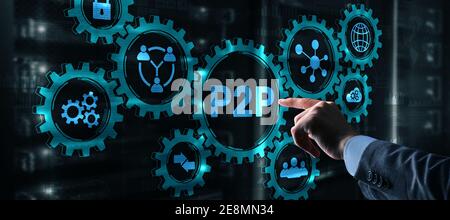 Businessman presses button p2p peer-to-peer on virtual interface Stock Photo