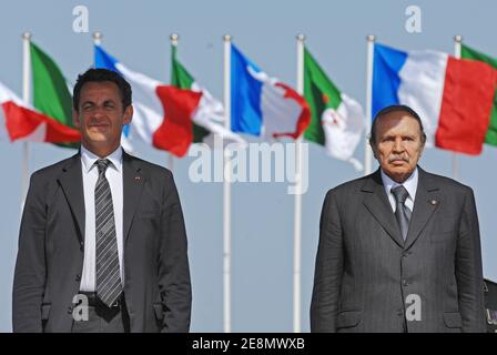 Algerian president Abdelaziz Bouteflika says goodbye to French president Nicolas Sarkozy at the Houari Boumedienne Airport in Algiers after an official trip in Algeria, on July 10, 2007. Photo by Christophe Guibbaud/ABACAPRESS.COM Stock Photo