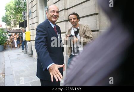 Former President Jacques Chirac arrives at his office on Lille Street ...