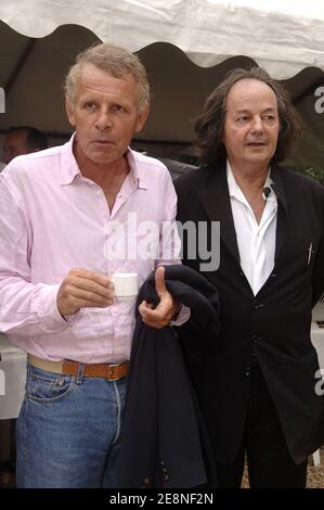 French journalist and TV presenter Patrick Poivre d'Arvor and Gonzague Saint-Bris during the writers lunch at the 12th 'Foret Des Livres' Chanceaux-Pres-Loches, France on August 26, 2007. Photo by Giancarlo Gorassini/ABACAPRESS.COM Stock Photo
