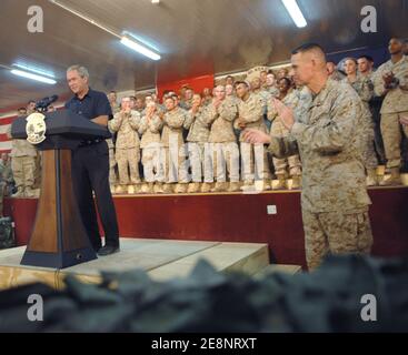 US President George W. Bush delivers his speech to service members during his surprise visit to Al Asad Air Base, Iraq on September 3, 2007. Bush rejected intensifying pressure from the Democratic-led Congress to start pulling troops immediately out of the unpopular war in Iraq. 'Those decisions will be based on a calm assessment by our military commanders on the conditions on the ground, not a nervous reaction by Washington politicians to poll results in the media,' the president said. Photo by DOD via ABACAPRESS.COM Stock Photo