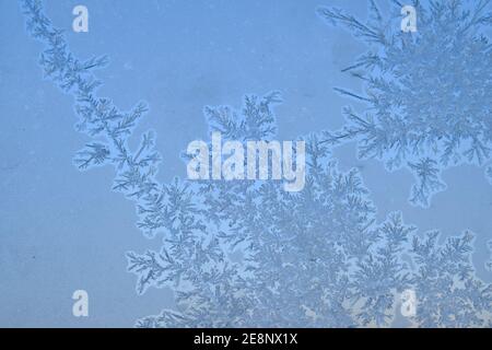 Elaborate and beautiful ice crystal patterns form on my window when it gets below -20C here in Ottawa, Ontario, Canada. Stock Photo
