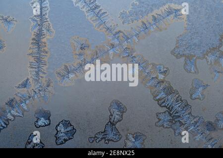 Elaborate and beautiful ice crystal patterns form on my window when it gets below -20C here in Ottawa, Ontario, Canada. Stock Photo