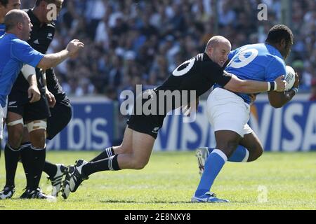 Italy's Sione Lauaka is tackled by New Zealand's Dan Carter during the IRB Rugby World Cup 2007, Pool C, New Zealand vs Italy at the Velodrome stadium in Marseille, France on September 8, 2007. Photo by Pool Rugby 2007/Cameleon/ABACAPRESS.COM Stock Photo