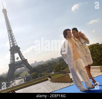 Cast members Jacky Chan and Noemie Lenoir pose for pictures during