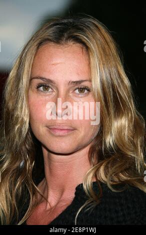 Agathe de La Fontaine and daughter Zoe at the launch party of UNICEF  calendar 2006, with picture of Diane Kruger, photographied by Christophe  Meimoon, held at the Bristol Hotel in Paris, France