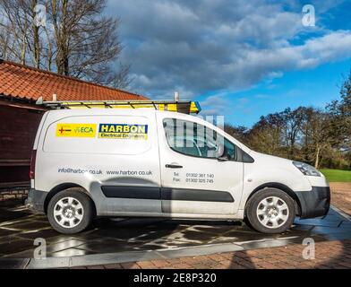 White electricians work van parked at. a private location Stock Photo