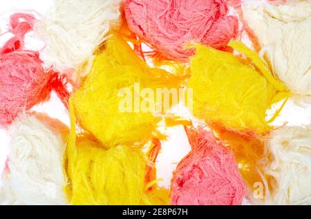 Turkish sweetness of sugar halvah pishmanie color. Stock Photo