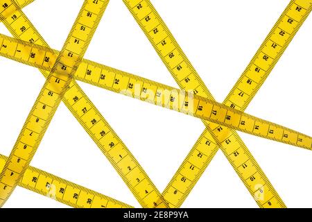 Yellow measuring tape isolated on white background Stock Photo