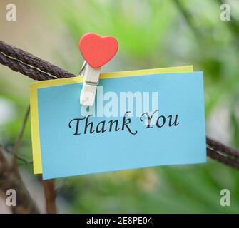 Thank You text on notepad and blue pen Stock Photo - Alamy