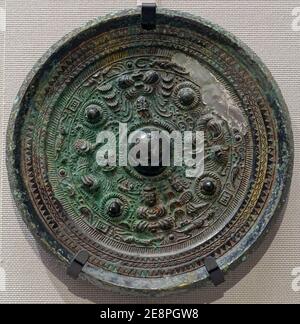 Mirror with triangular rim and dragon and tiger design, 8 of 12, Japan, Kofun period, 200s-300s AD, bronze Stock Photo