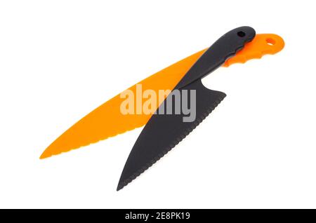 Kitchen plastic colored knives. Studio Photo Stock Photo