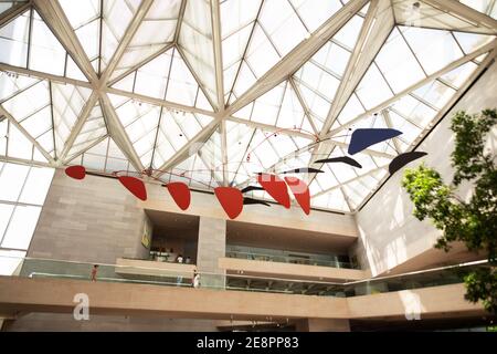 Alexander Calder's last work, an untitled mobile, hangs inside the Central Court of the East Building, National Gallery of Art in Washington, DC. Stock Photo