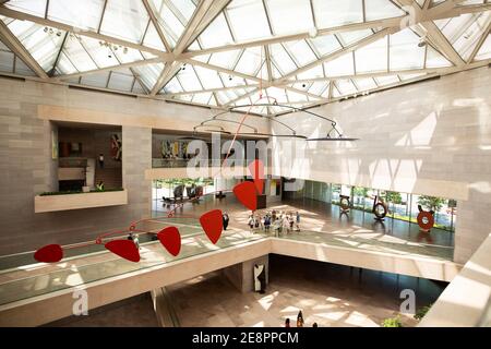 Alexander Calder's last work, an untitled mobile, hangs inside the Central Court of the East Building, National Gallery of Art in Washington, DC. Stock Photo