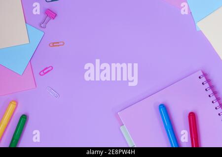 School supplies for study on pink background. Back to school. View from above. Stock Photo