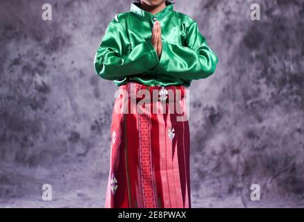 Acehnese traditional clothes with sizes for children are used as clothes for Saman dancers. Indonesian traditional clothes with bright colors. Sumatra Stock Photo