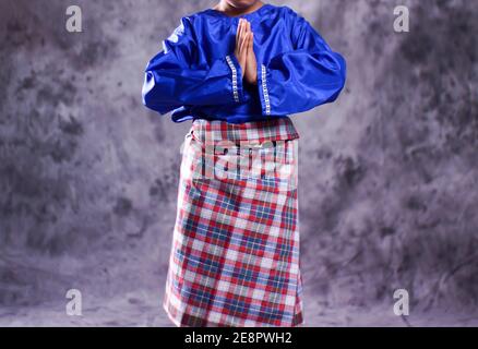 Acehnese traditional clothes with sizes for children are used as clothes for Saman dancers. Indonesian traditional clothes with bright colors. Sumatra Stock Photo