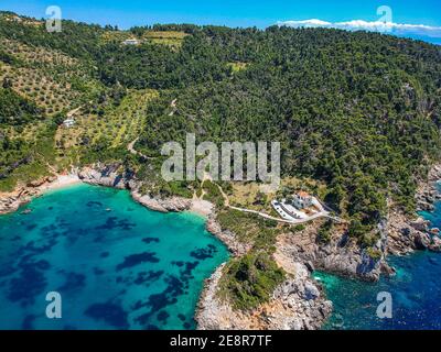 Aerial drone view over Chrisi Milia beach and the rocky surrounded area in Alonnisos island, Sporades, Greece, Europe Stock Photo