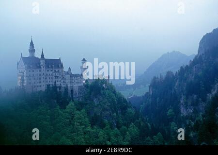 Germany/Bavaria/King Ludwigs Castel , Castle Neuschwanstein in the mist Stock Photo