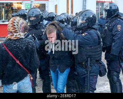 Moscow, Russia. 31st Jan, 2021. Police officers detain a protester during the demonstration. More than five thousand people were detained during the rallies held in various cities of Russia in support of the opposition leader Alexey Navalny who was arrested on January 17 when he returned from Germany, where he had spent five month recovering from poisoning. Credit: SOPA Images Limited/Alamy Live News Stock Photo