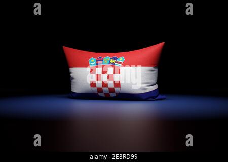 3d illustration of rectangular pillow depicting the national flag of Croatia under red light on black isolated background Stock Photo