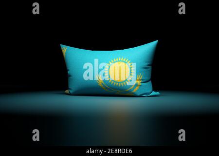 3d illustration of rectangular pillow depicting the national flag of Kazakhstan under red light on black isolated background Stock Photo