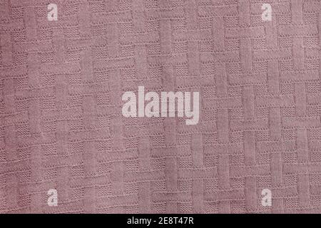 Pale pink Wool fabric texture. Factory wool knit. Fabric background. Stock Photo
