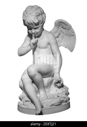 White angel figurine isolated on white background. Cupid sculpture. Stone statue of young cherub Stock Photo