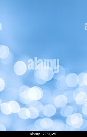 Light blue holiday bokeh abstract Christmas background Stock Photo