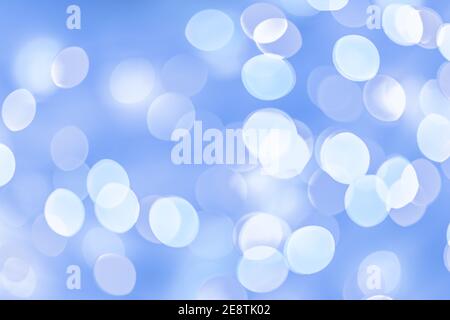 Light blue and white holiday bokeh Christmas background Stock Photo