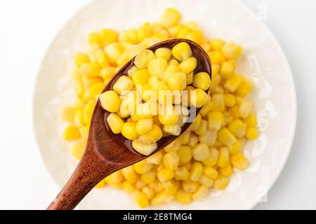 Canned corn on a white background Stock Photo