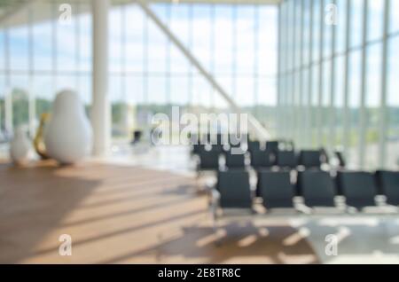 Office building or university library lobby hall reading area blur background with hall interior Stock Photo