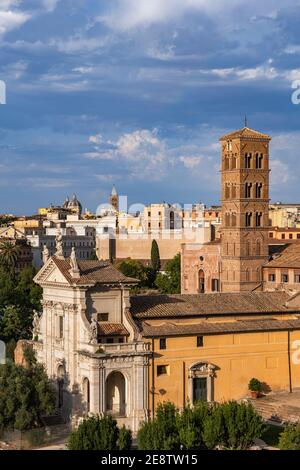 City of Rome in Italy, Basilica di Santa Francesca Romana, Roman Catholic church with 12th century Romanesque bell tower Stock Photo