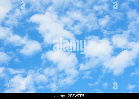 Spring clouds in the blue sky, may be used as background Stock Photo
