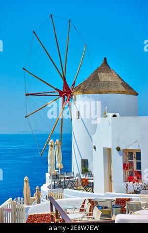 While windmill in Santorini island in Greece Stock Photo