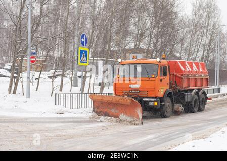 Moscow. Russia. Winter 2021. A large snow plow clears the snow from the road. Stock Photo