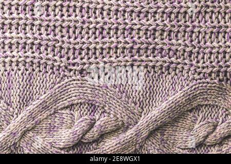 Purple texture background of knitted fabric sweaters, cozy home pattern photo Stock Photo
