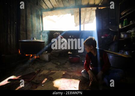 The Gaza Strip, The Gaza Strip, Palestine. 1st Feb, 2021. Palestinians make food and distribute it on poor kids at the Gaza Strip Credit: Hassan Jedi/Quds Net News/ZUMA Wire/Alamy Live News Stock Photo