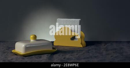Still life of an oilcan and a yellow napkin holder with white napkins on a tablecloth made of gray natural linen on a gray background. Stock Photo