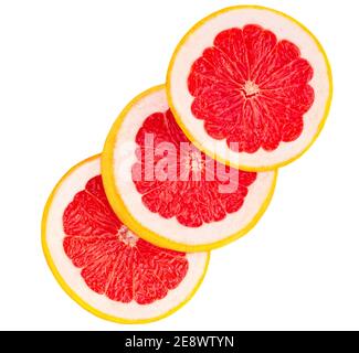 Grapefruit circle slices  isolated  on white background, top view.  Pink Grapefruit Flat lay. Stock Photo