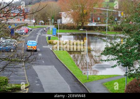 Mold, Flintshire; UK: Jan 28, 2021:  The Love Lane car park in the North Wales market town of Mold is flooded following recent storms and excessive ra Stock Photo